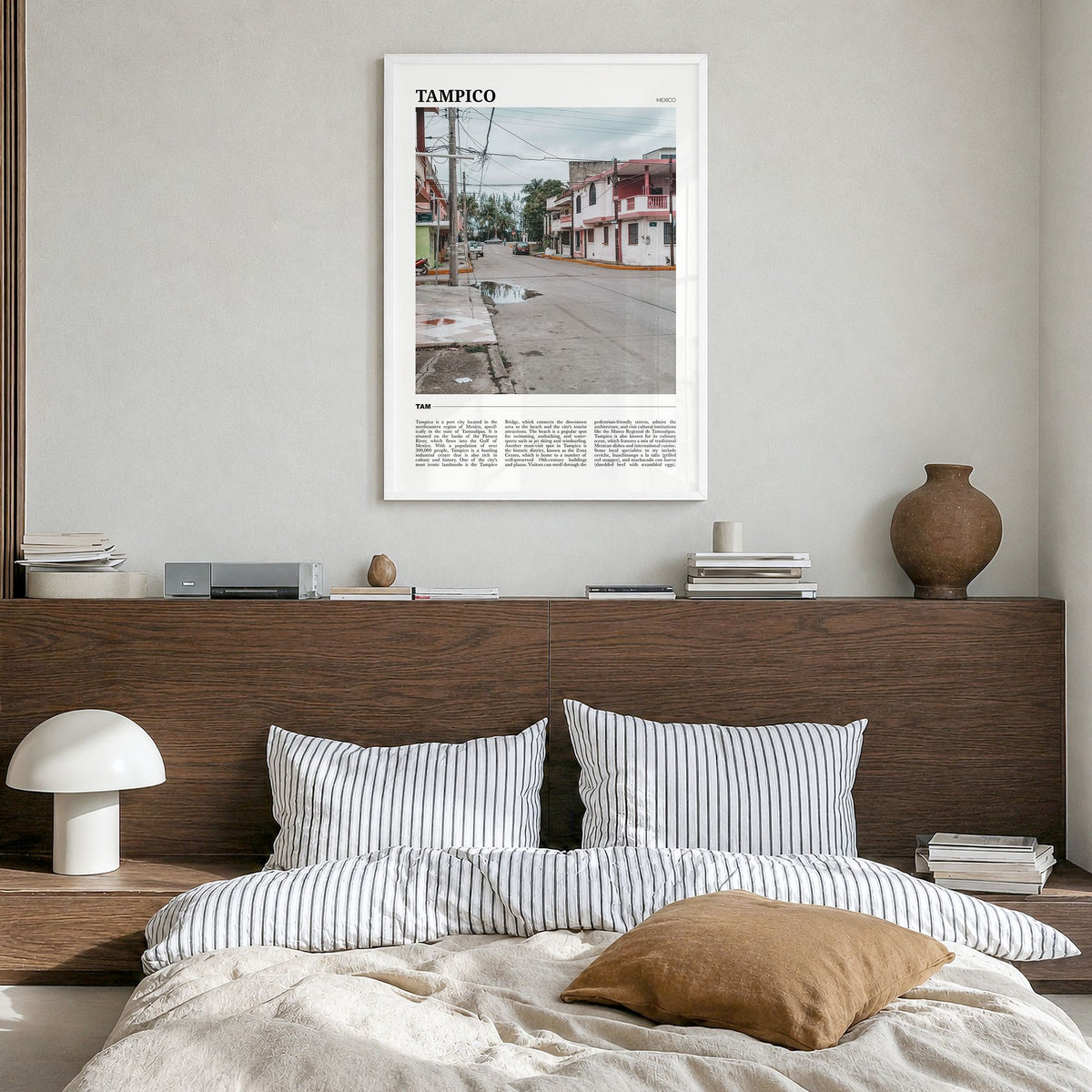 Tampico Travel Poster in a white wood frame, hanging in a bedroom