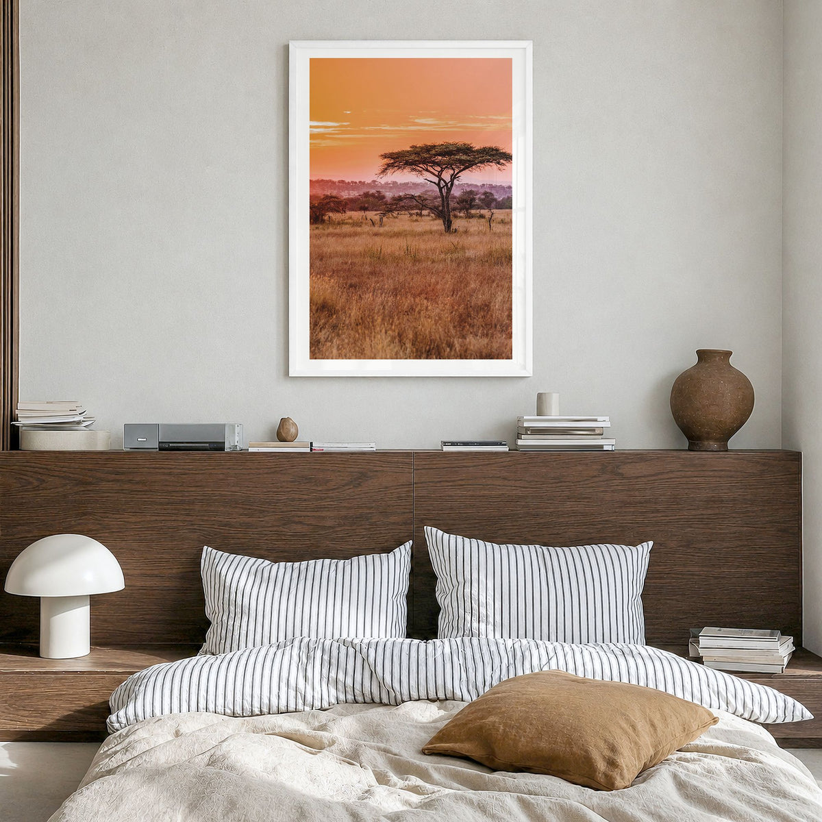 Tanzania Photo Poster in a white wood frame, hanging in a bedroom, white border