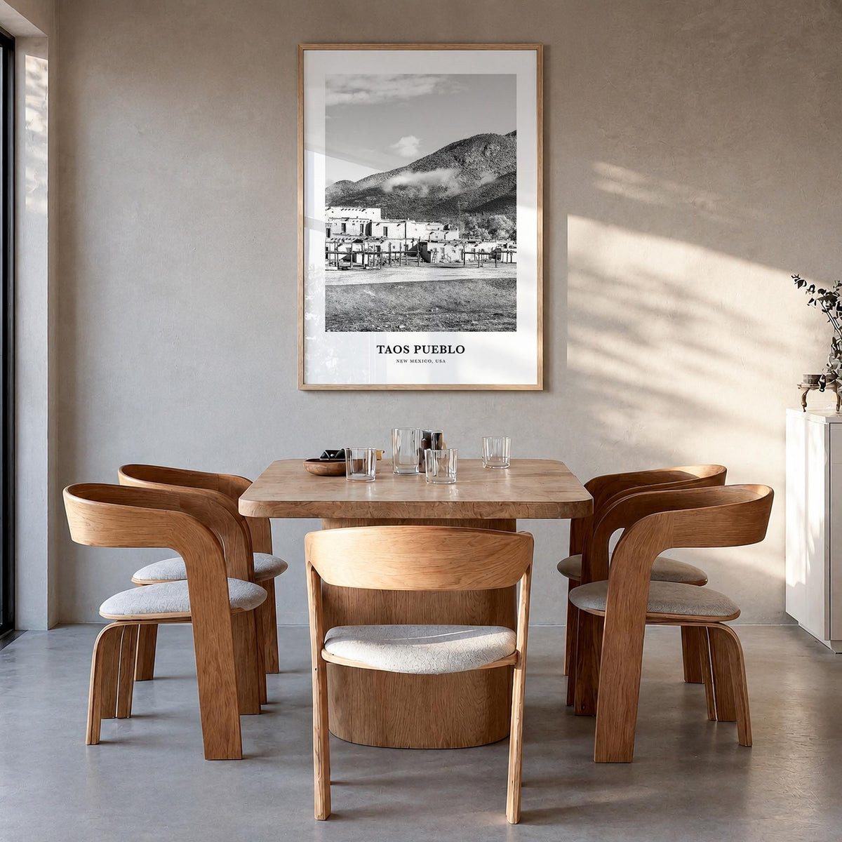 Taos Pueblo black & white classic poster of New Mexico, USA – vertical wall art in natural wood frame, hanging on wall