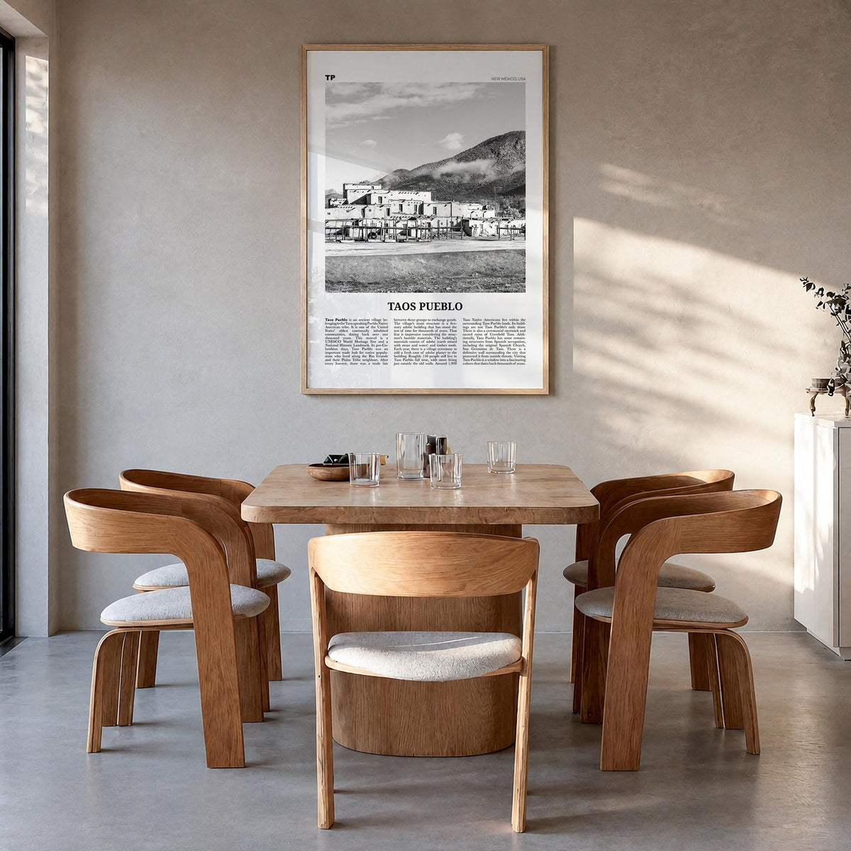 Taos Pueblo black & white newspaper poster of New Mexico, USA – vertical wall art in natural wood frame, hanging on wall