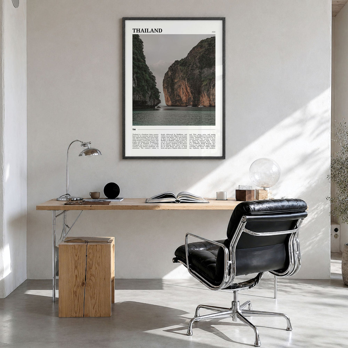 Thailand Travel Poster in a black wood frame, hanging in a bright home office