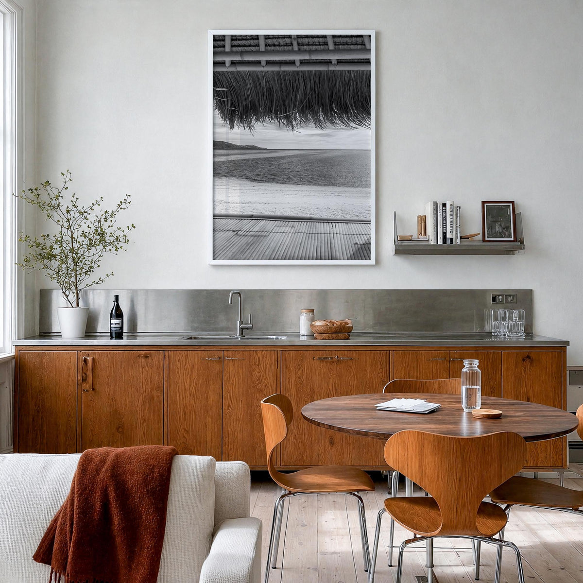 Thatched Hut no. 1 black & white photo poster – vertical wall art in white wood frame, hanging on wall