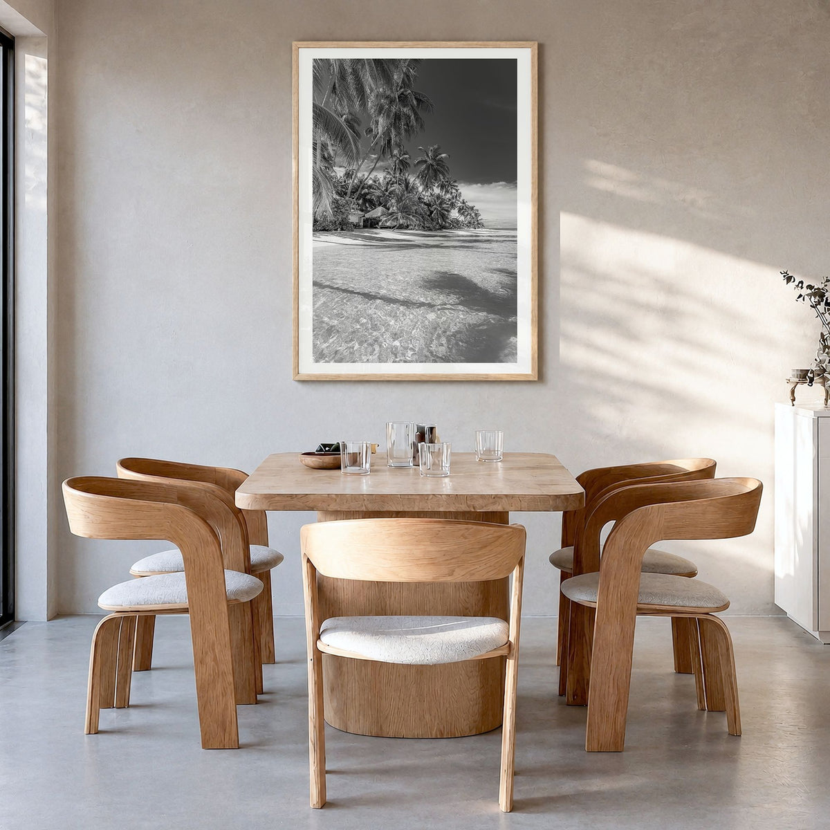 The Bahamas Photo Poster in a natural wood frame, hanging in a dining room, white border