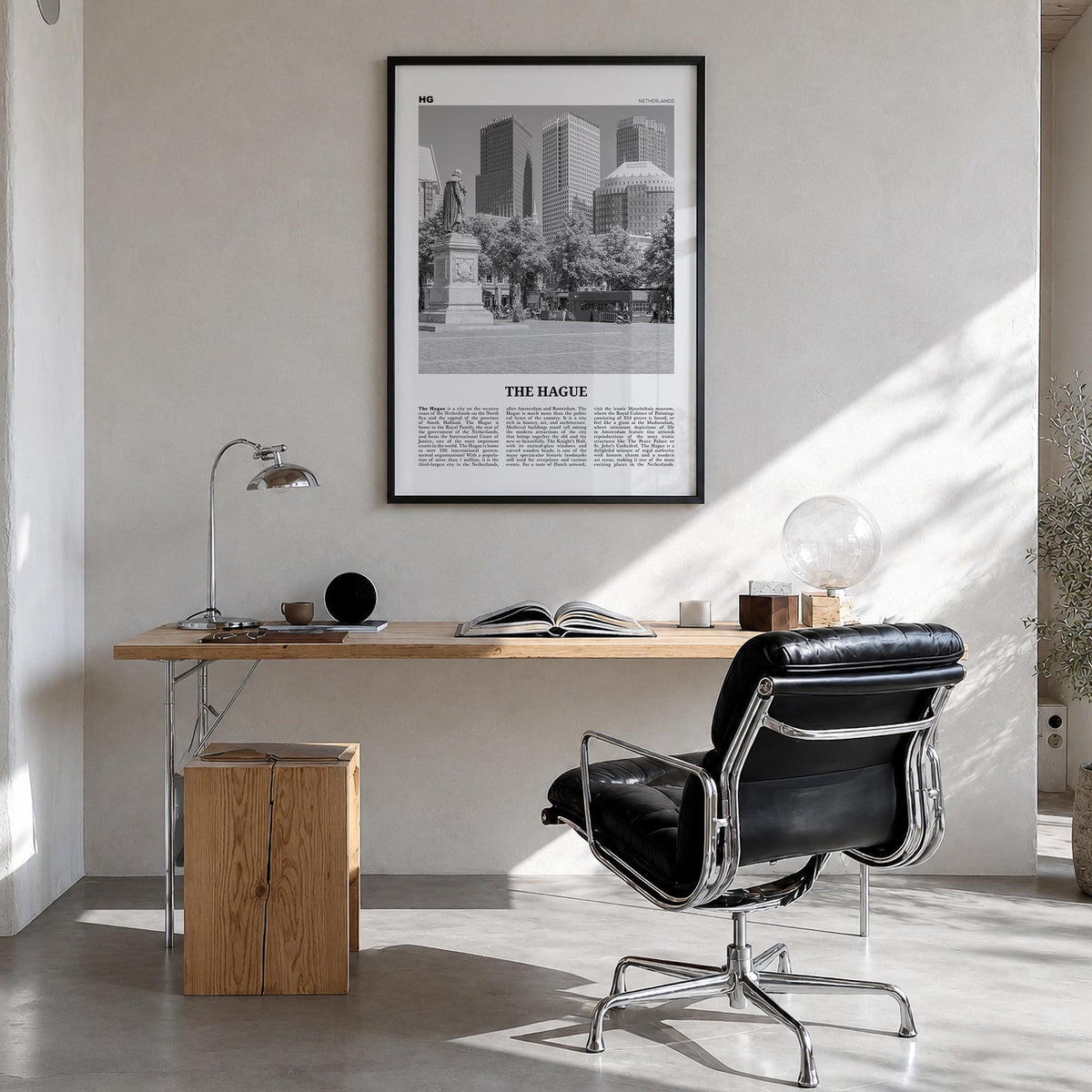 The Hague black & white newspaper poster of Netherlands – vertical wall art in black wood frame, hanging on wall
