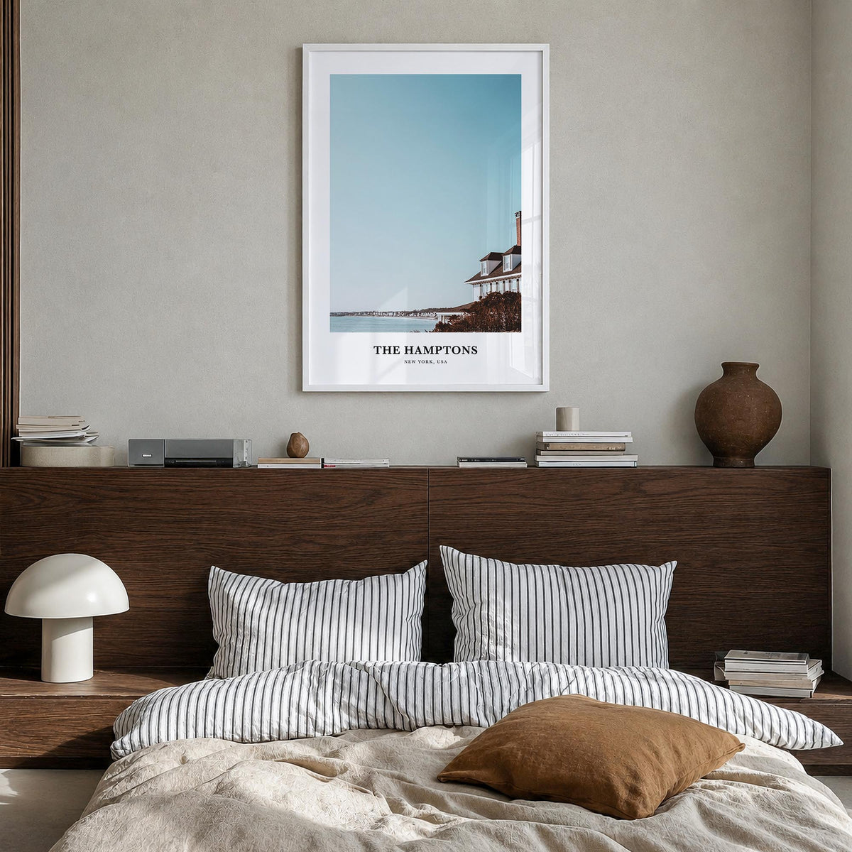 The Hamptons colorful classic poster of Long Island, New York – vertical wall art in white wood frame, hanging on wall