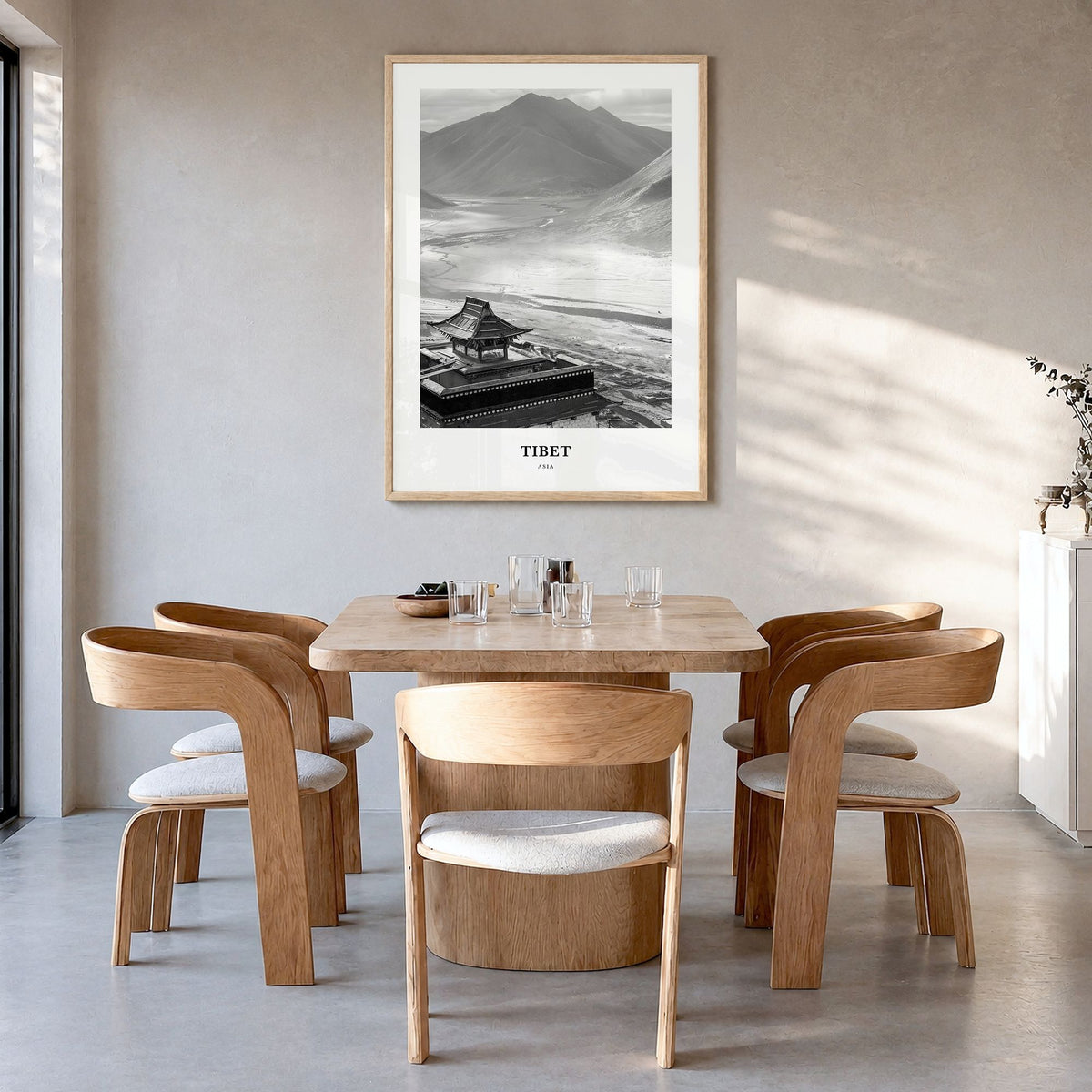 Tibet Classic Poster in a natural wood frame, hanging in a dining room