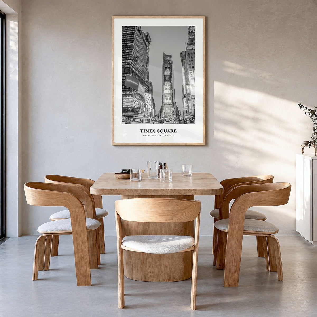 Times Square Classic Poster in a natural wood frame, hanging in a dining room