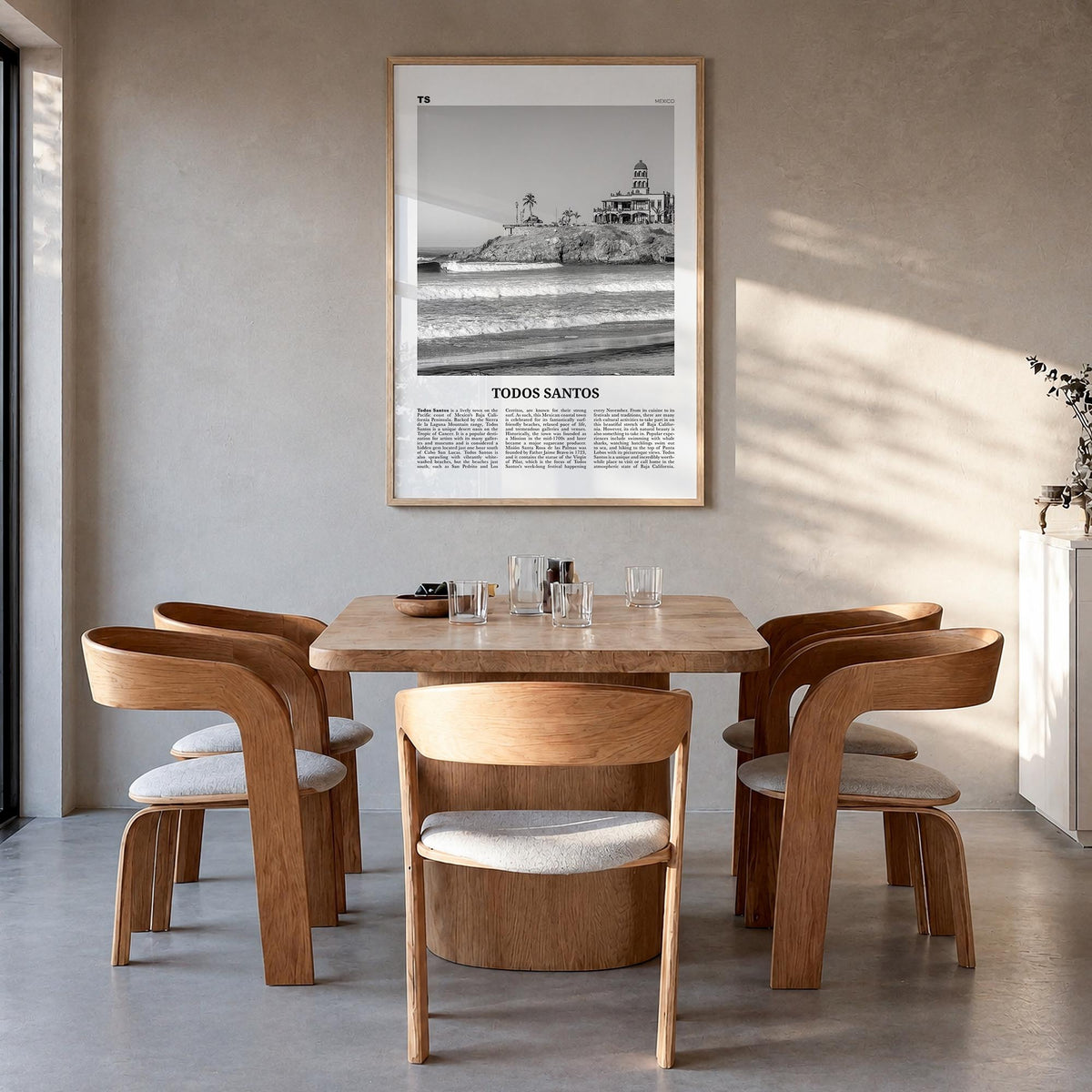 Todos Santos black & white newspaper poster of Mexico – vertical wall art in natural wood frame, hanging on wall