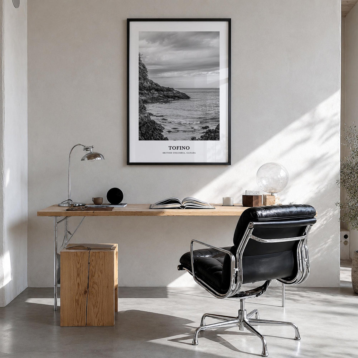 Tofino black & white classic poster of British Columbia, Canada – vertical wall art in black wood frame, hanging on wall