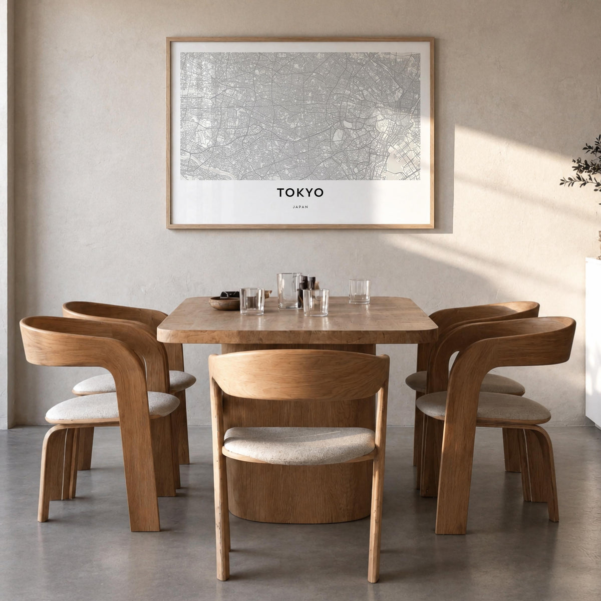Tokyo black & white map poster of Japan – horizontal wall art in natural wood frame, hanging on wall