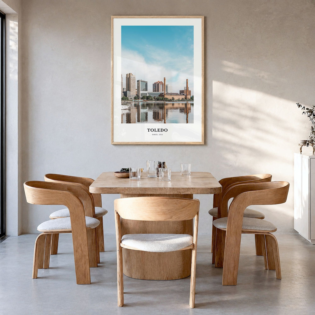 Toledo, Ohio Classic Poster in a natural wood frame, hanging in a dining room
