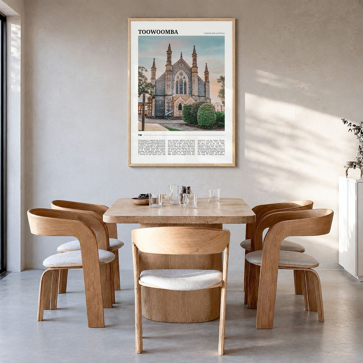 Toowoomba Travel Poster in a natural wood frame, hanging in a dining room