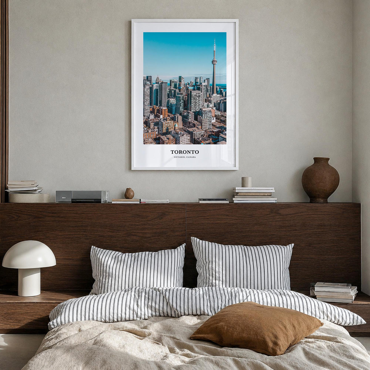 Toronto colorful classic poster of Ontario, Canada – vertical wall art in white wood frame, hanging on wall