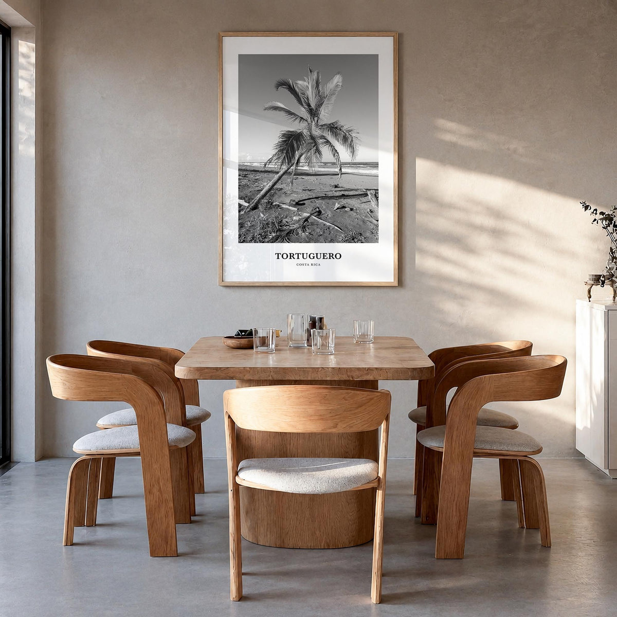 Tortuguero black & white classic poster of Costa Rica – vertical wall art in natural wood frame, hanging on wall