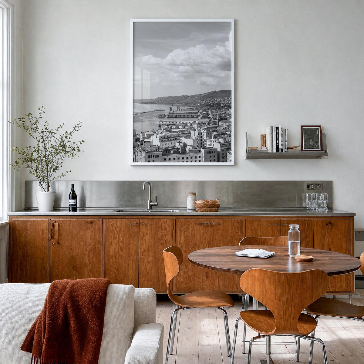 Trieste black & white photo poster of Italy – vertical wall art in white wood frame, hanging on wall