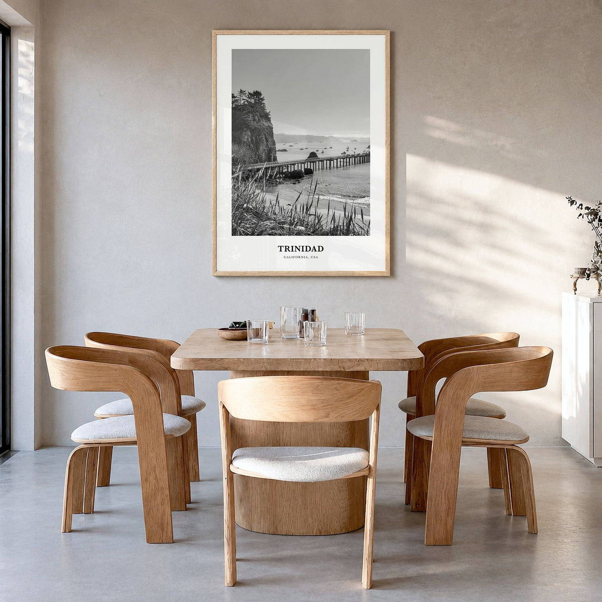 Trinidad, California Classic Poster in a natural wood frame, hanging in a dining room