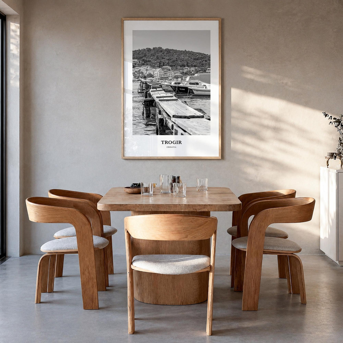 Trogir black & white classic poster of Croatia – vertical wall art in natural wood frame, hanging on wall