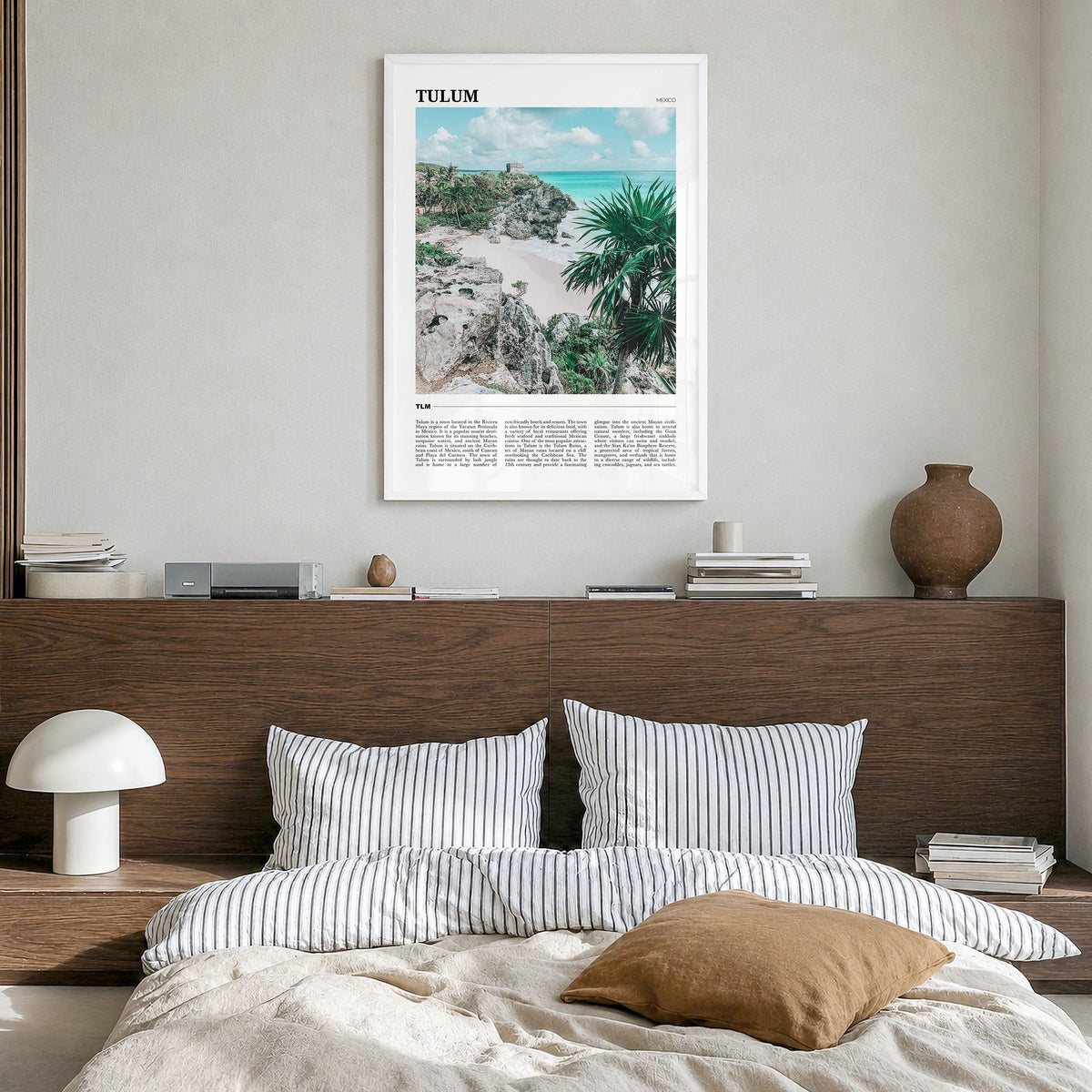 Tulum Travel Poster in a white wood frame, hanging in a bedroom