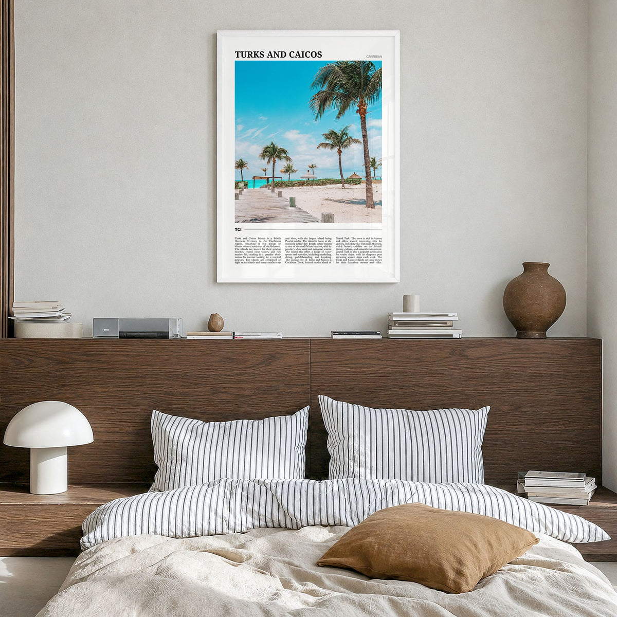 Turks and Caicos Islands Travel Poster in a white wood frame, hanging in a bedroom