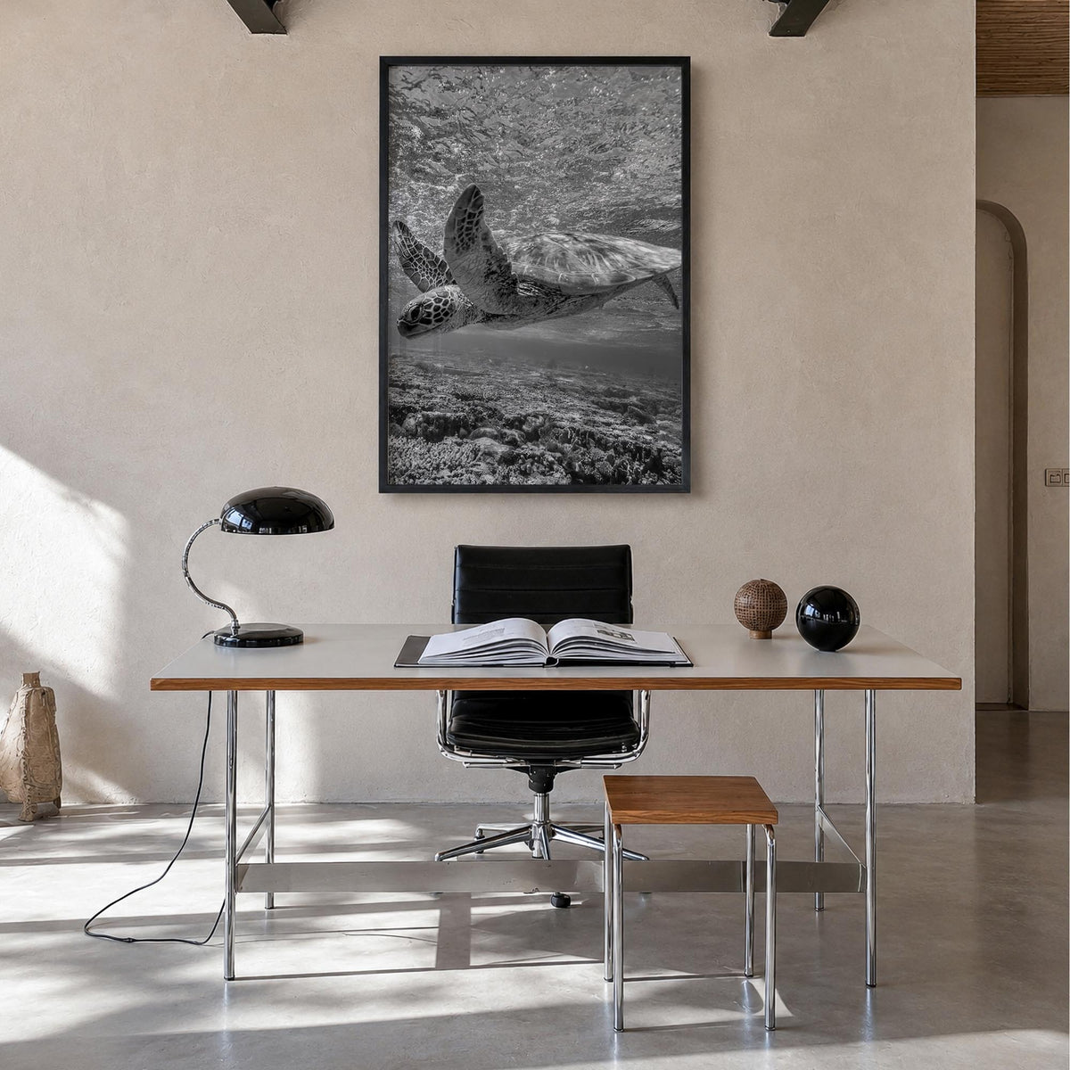 Turtle black & white photo poster – vertical wall art in black wood frame, hanging on wall