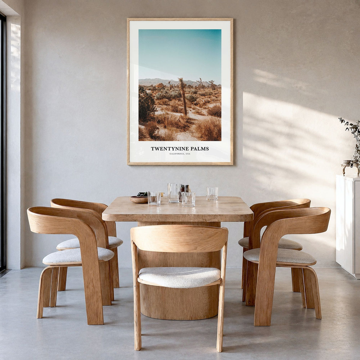 Twentynine Palms Classic Poster in a natural wood frame, hanging in a dining room