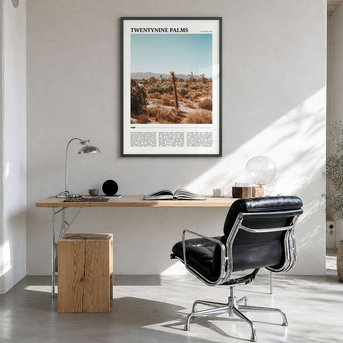 Twentynine Palms Travel Poster in a black wood frame, hanging in a bright home office