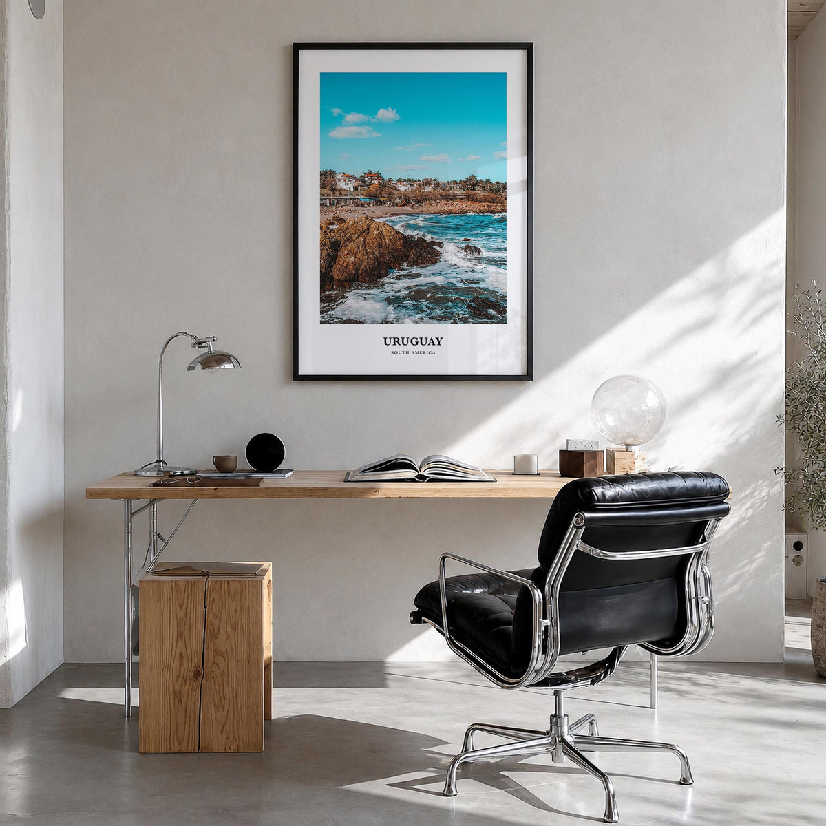 Uruguay colorful classic poster of South America – vertical wall art in black wood frame, hanging on wall
