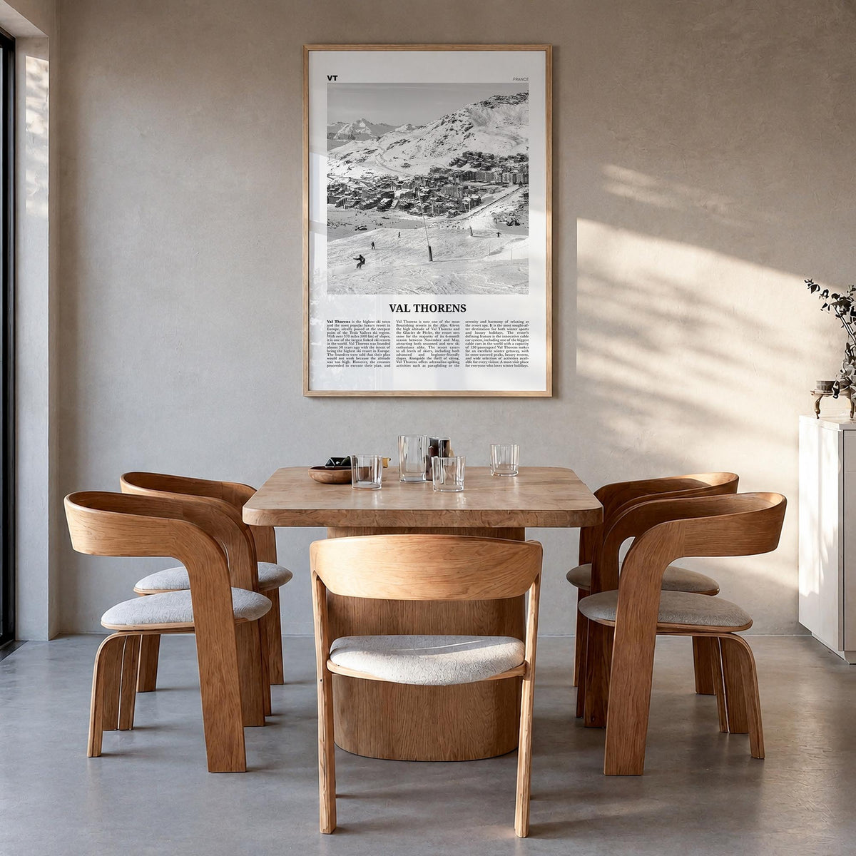 Val Thorens black & white newspaper poster of France – vertical wall art in natural wood frame, hanging on wall