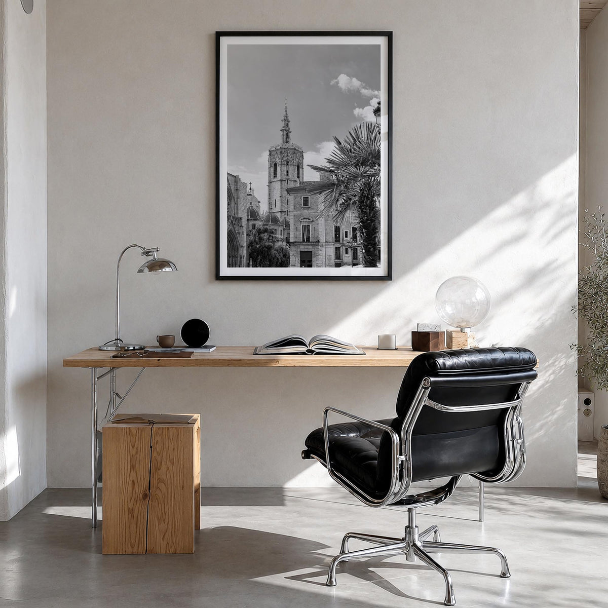 Valencia black & white photo poster of Spain – vertical wall art in black wood frame with white border, hanging on wall