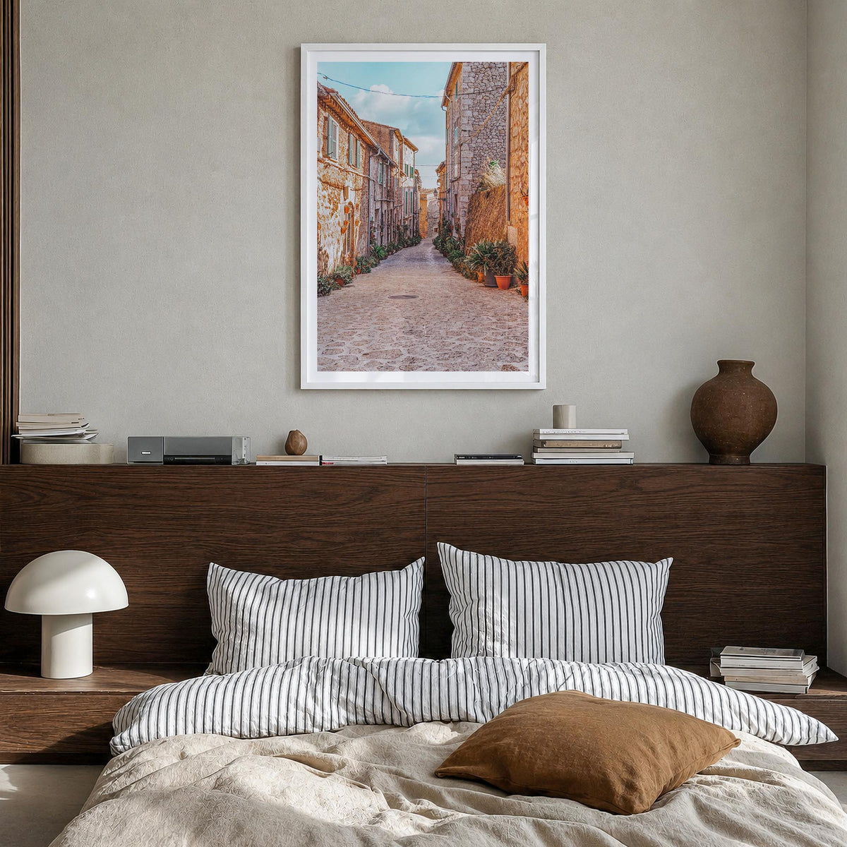 Valldemossa colorful photo poster of Spain – vertical wall art in white wood frame with white border, hanging on wall