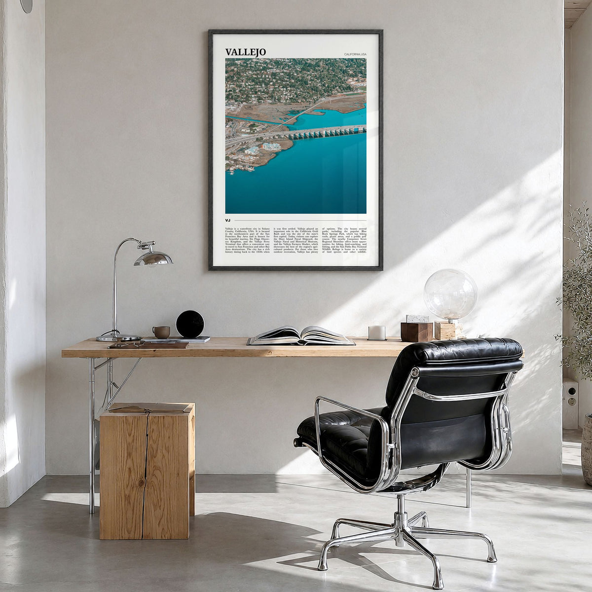 Vallejo Travel Poster in a black wood frame, hanging in a bright home office
