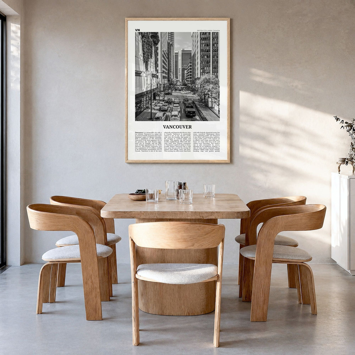 Vancouver, Canada Newspaper No 3 Poster in a natural wood frame, hanging in a dining room