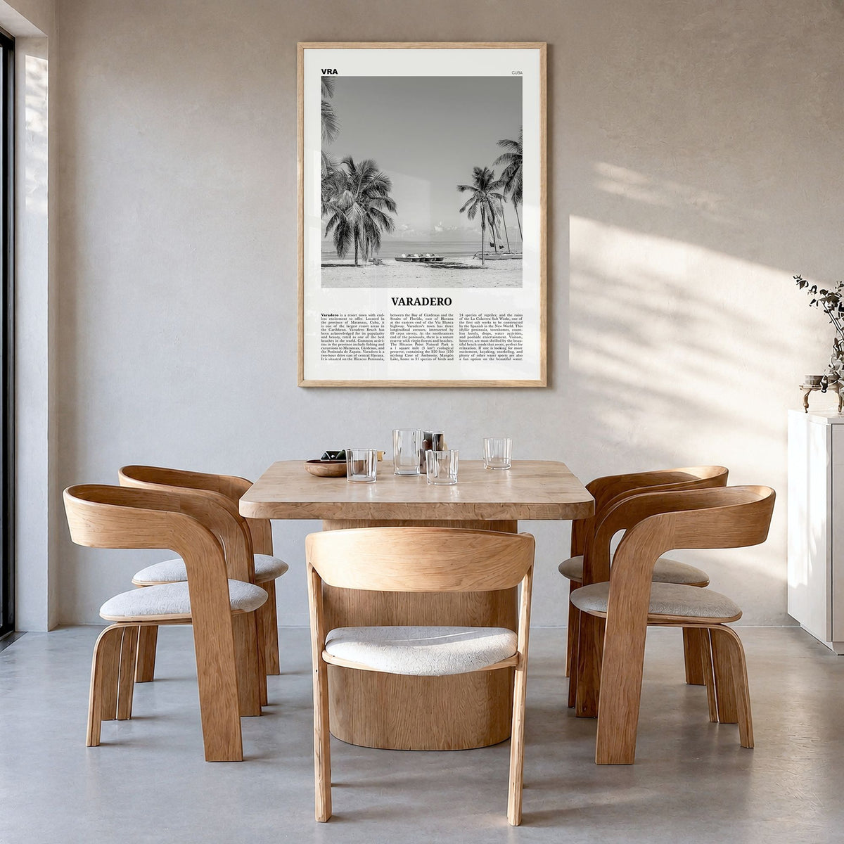 Varadero Newspaper Poster in a natural wood frame, hanging in a dining room