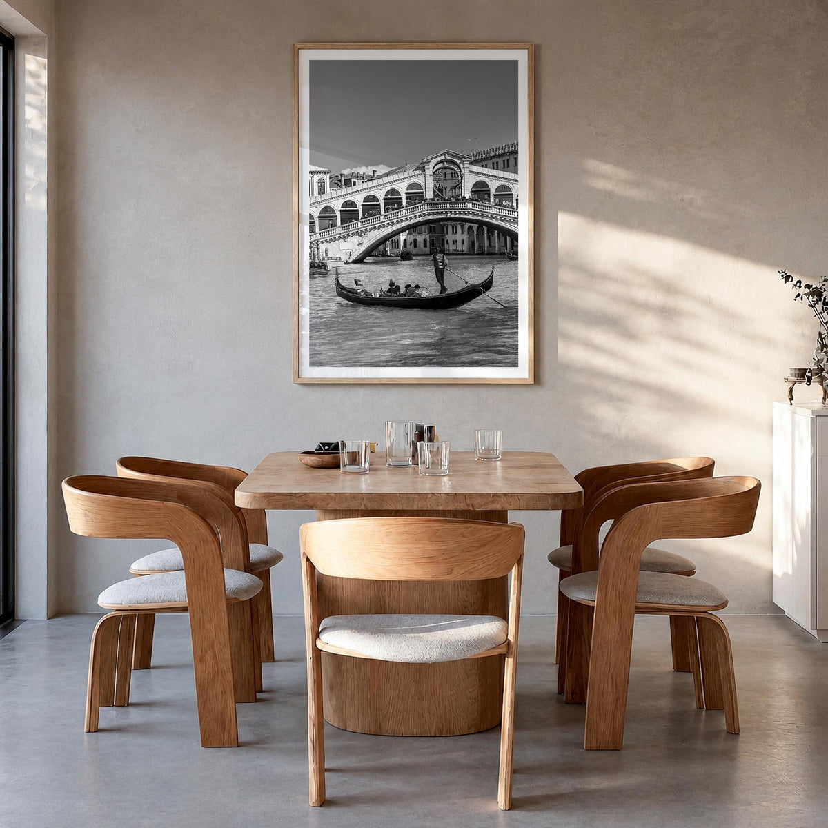 Venice no. 2 black & white photo poster of Italy – vertical wall art in natural wood frame with white border, hanging on wall