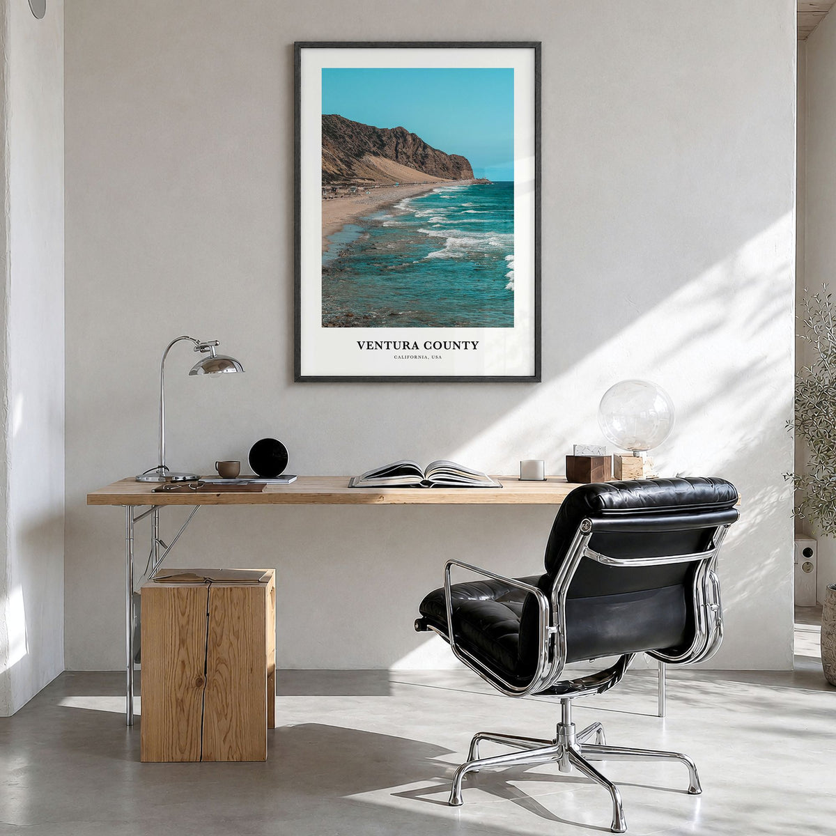 Ventura County Classic Poster in a black wood frame, hanging in a bright home office