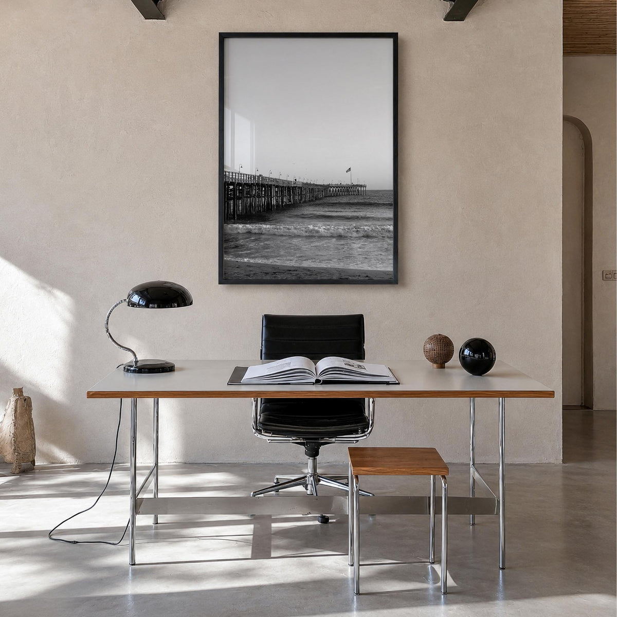 Ventura no. 1 black & white photo poster of California, USA – vertical wall art in black wood frame, hanging on wall