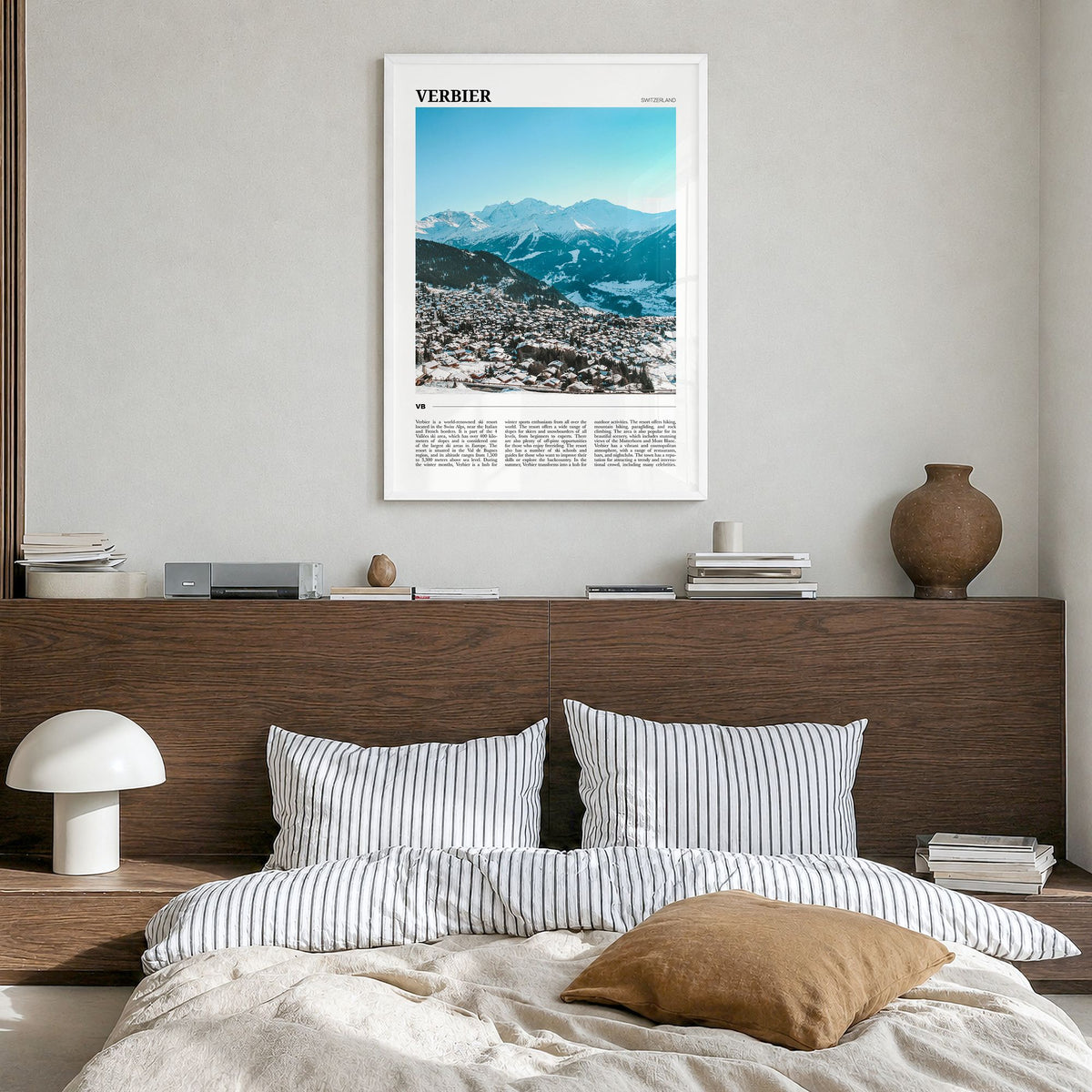 Verbier Travel Poster in a white wood frame, hanging in a bedroom