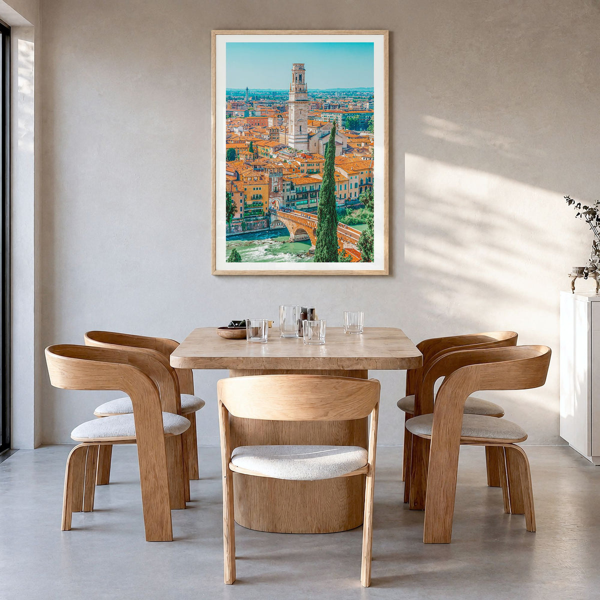 Verona Photo Poster in a natural wood frame, hanging in a dining room, white border