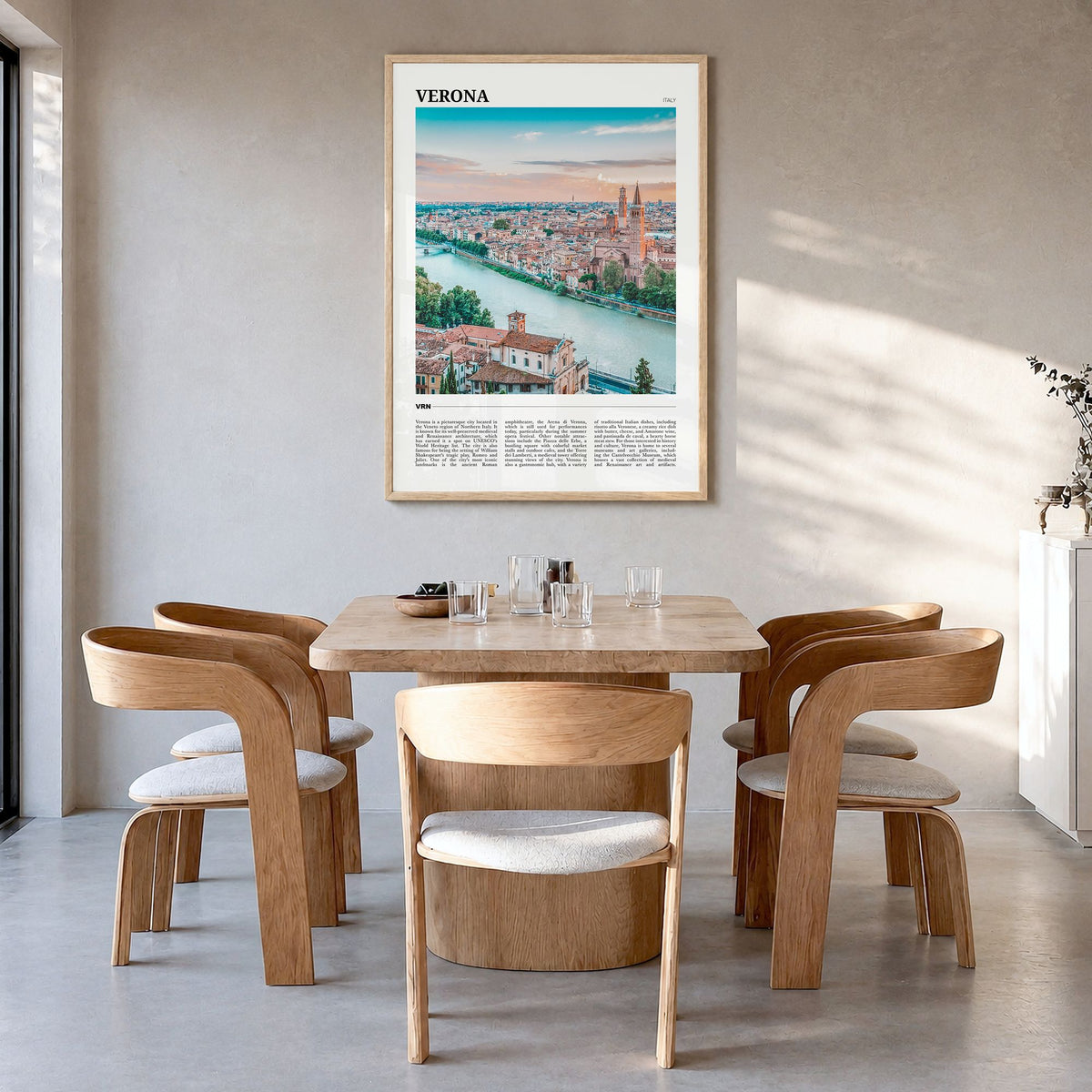 Verona Travel Poster in a natural wood frame, hanging in a dining room