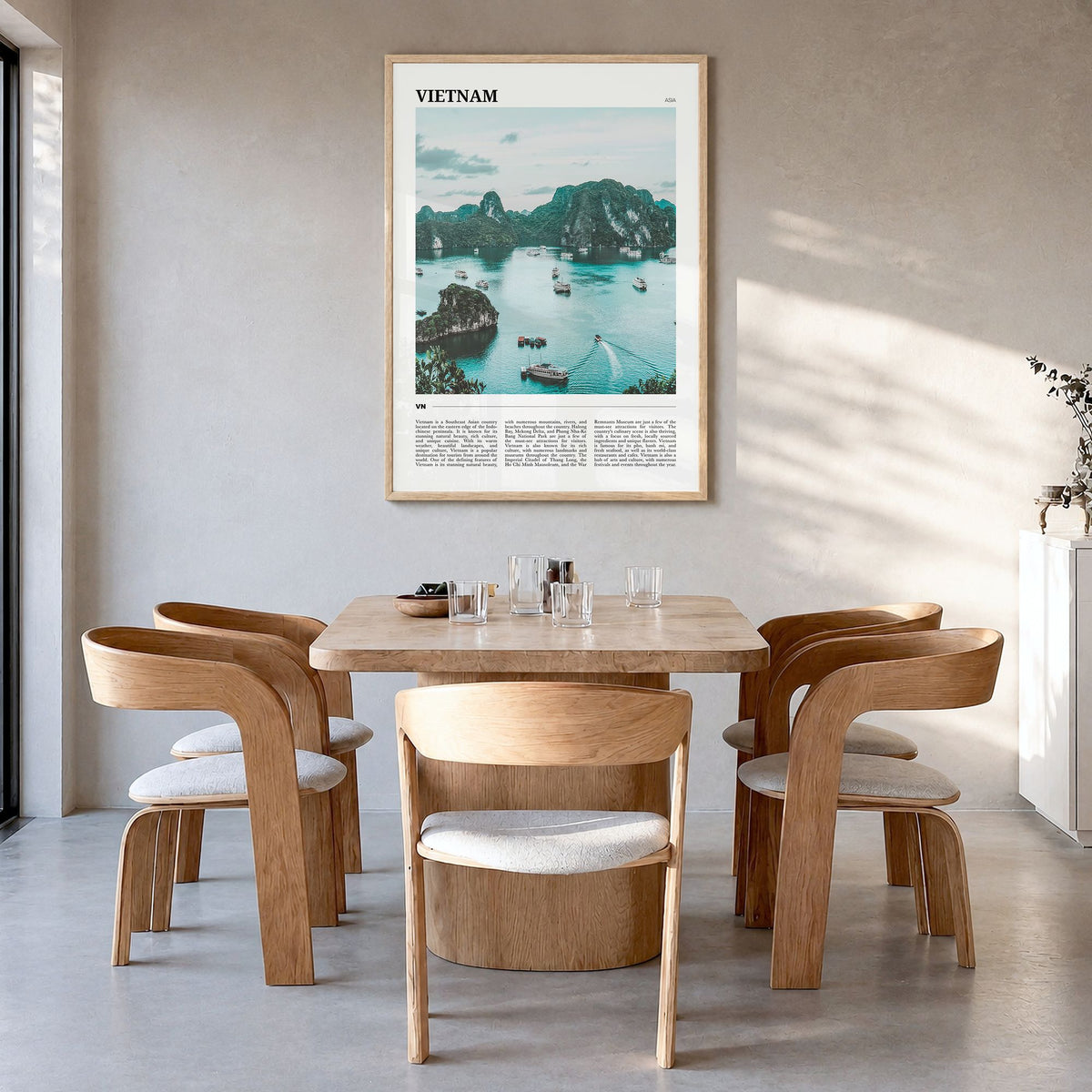 Vietnam Travel Poster in a natural wood frame, hanging in a dining room