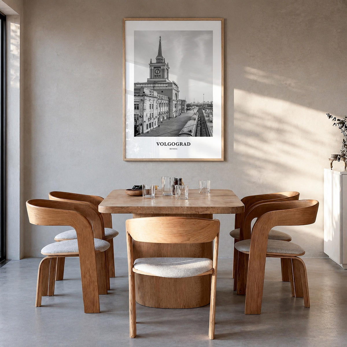 Volgograd black & white classic poster of Russia – vertical wall art in natural wood frame, hanging on wall