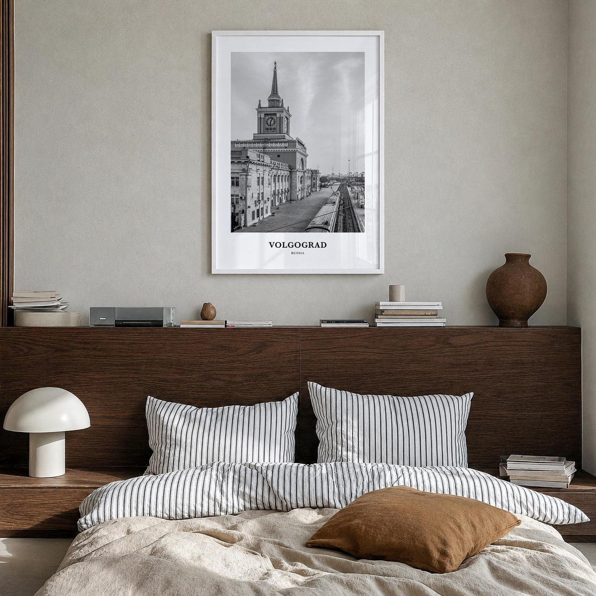 Volgograd black & white classic poster of Russia – vertical wall art in white wood frame, hanging on wall