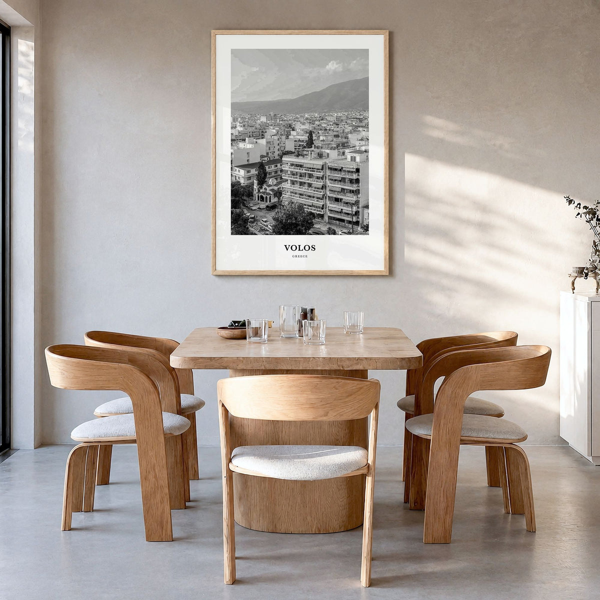 Volos Classic Poster in a natural wood frame, hanging in a dining room