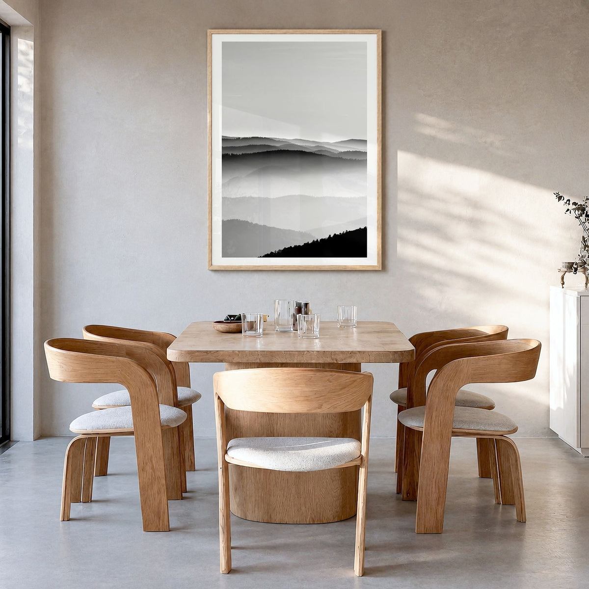 Vosges Mountains Photo Poster in a natural wood frame, hanging in a dining room, white border