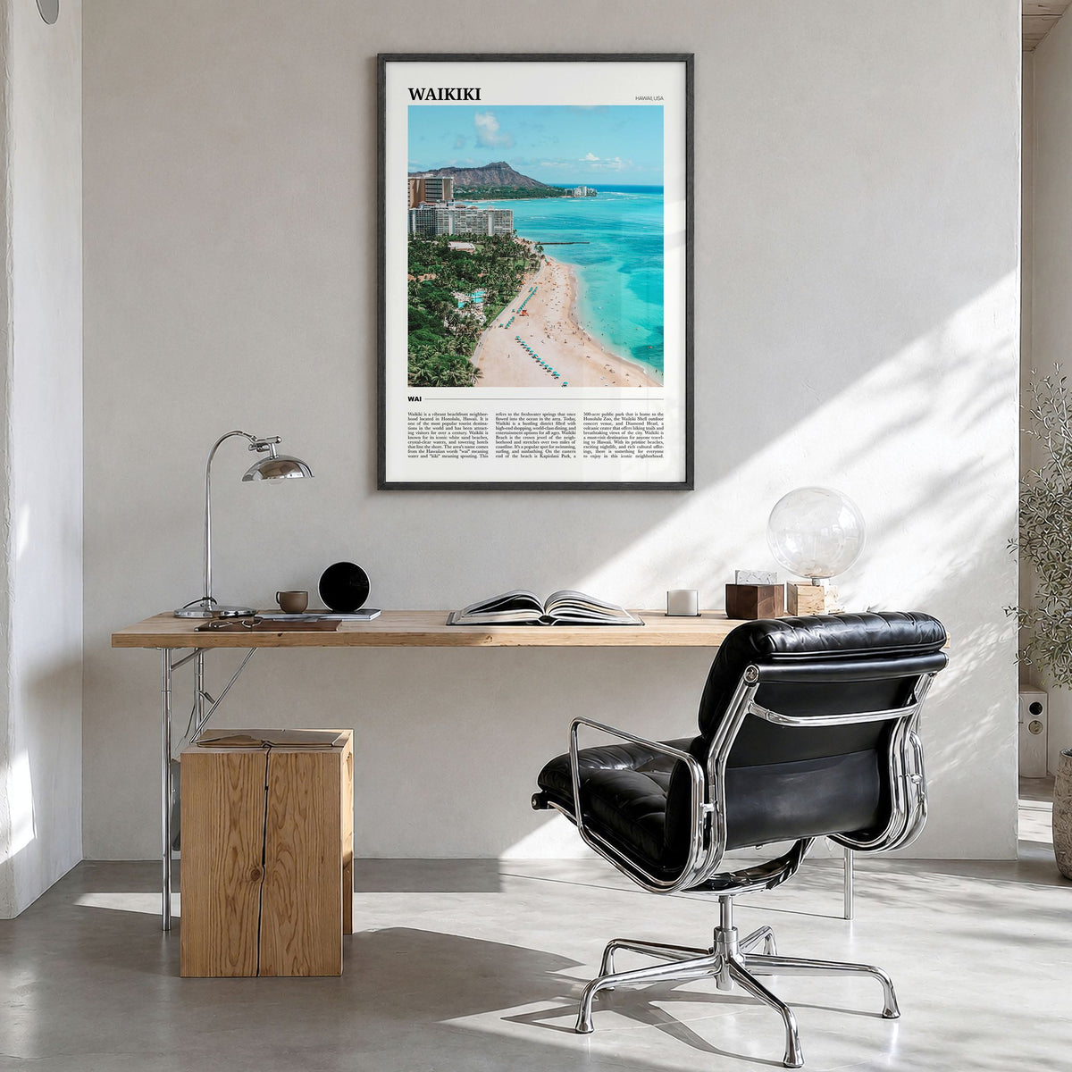 Waikiki Travel Poster in a black wood frame, hanging in a bright home office