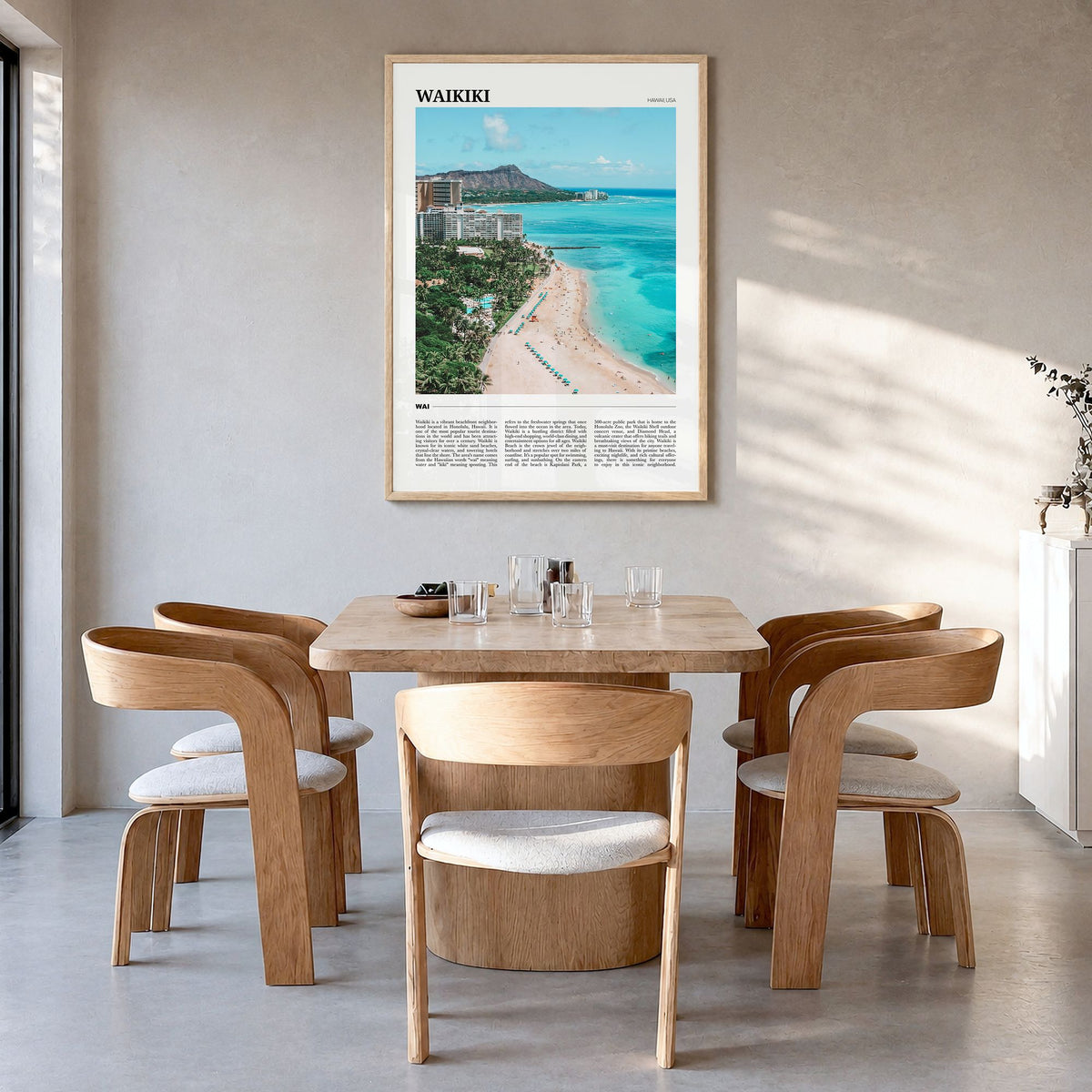 Waikiki Travel Poster in a natural wood frame, hanging in a dining room