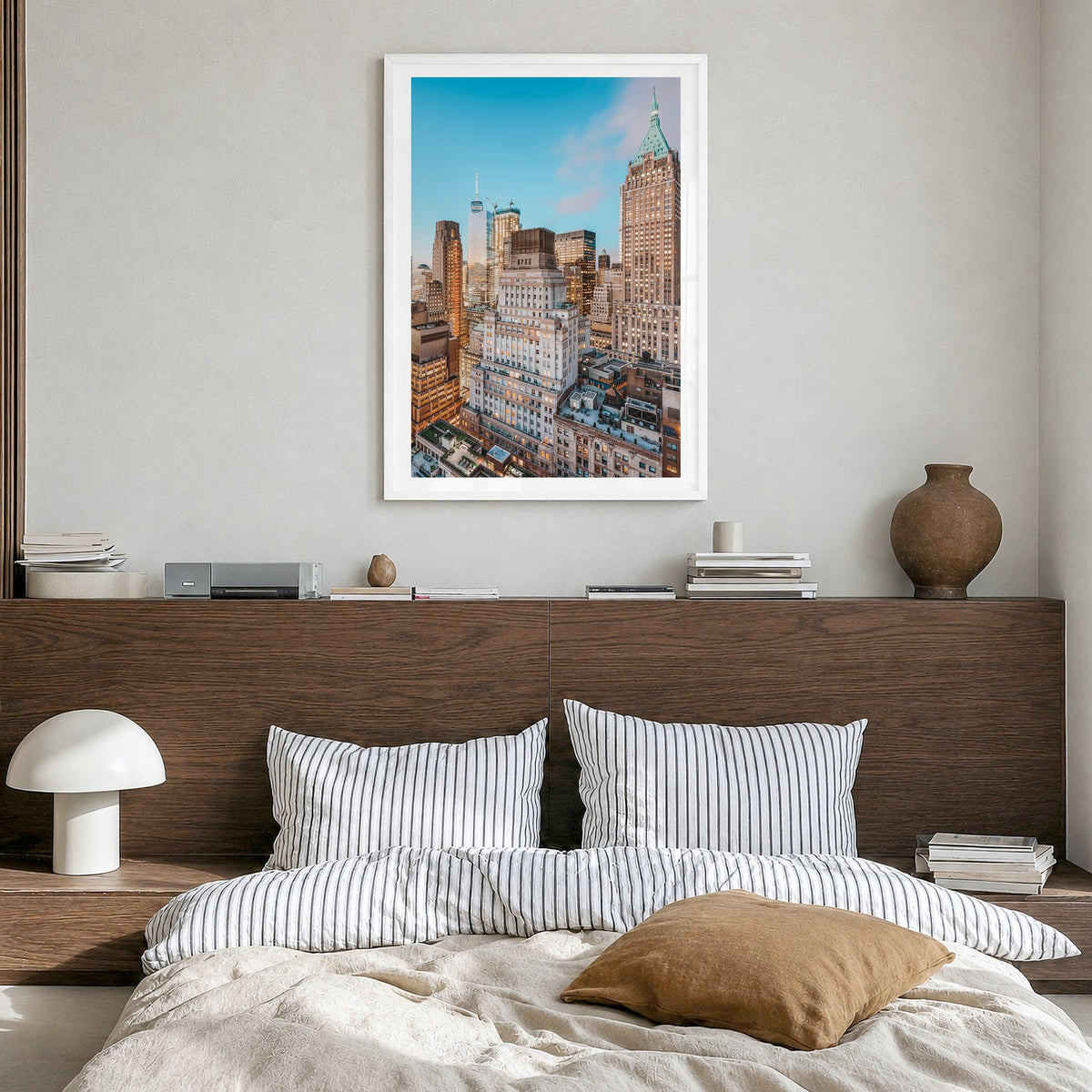 Wall Street Photo Poster in a white wood frame, hanging in a bedroom, white border