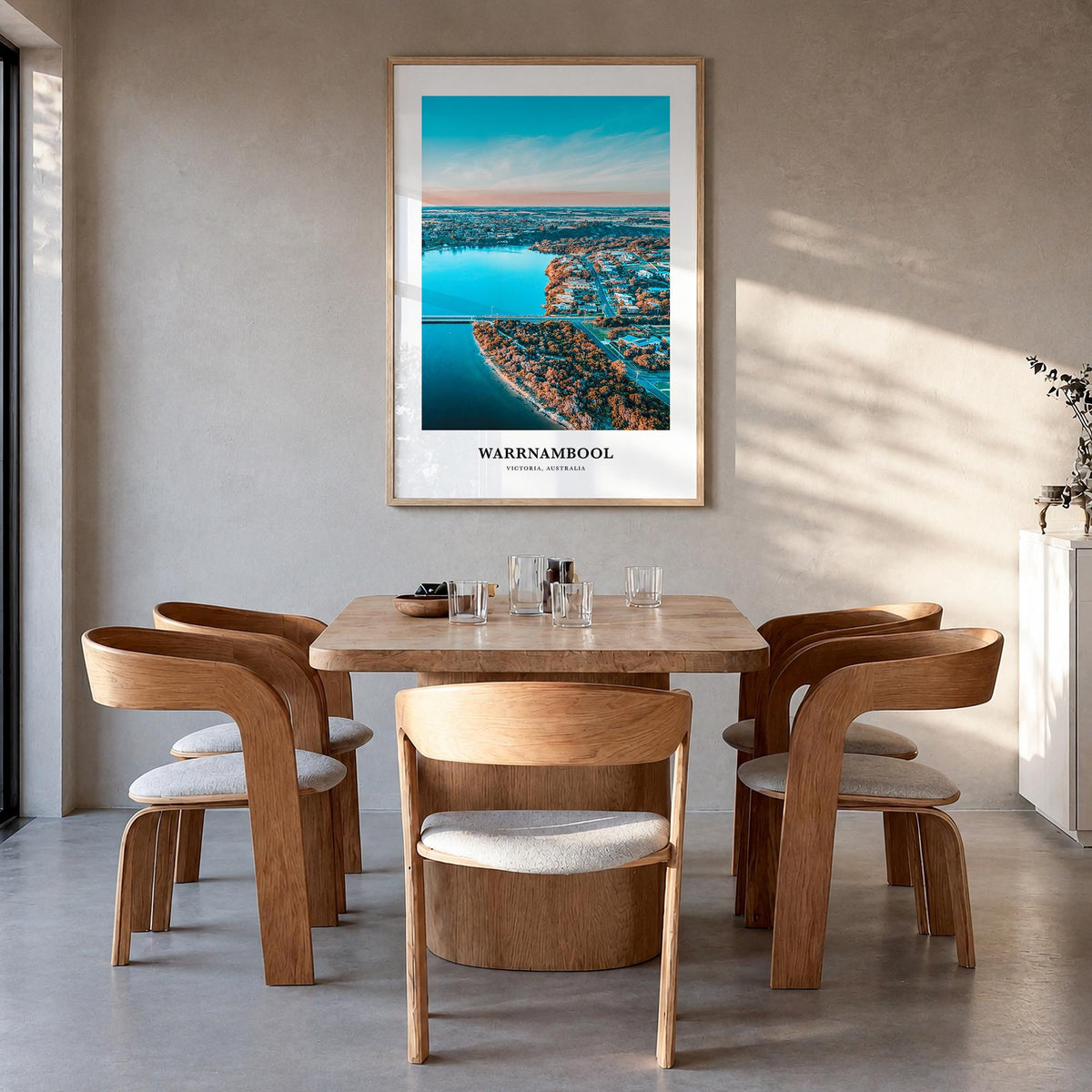 Warrnambool colorful classic poster of Australia – vertical wall art in natural wood frame, hanging on wall