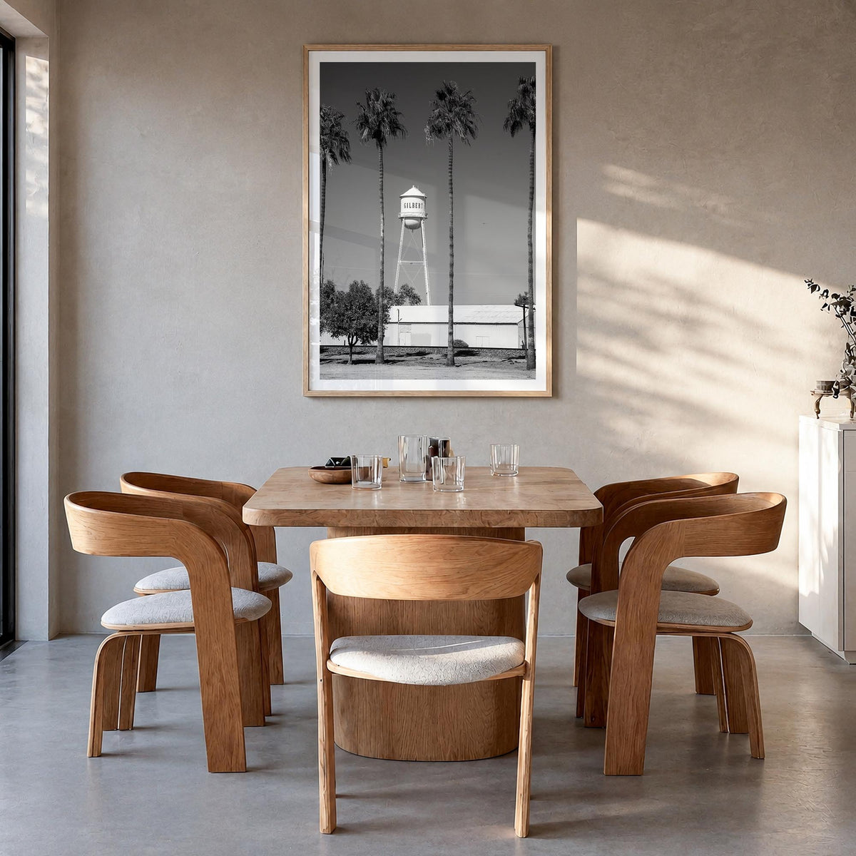 Water Tower no. 2 black & white photo poster – vertical wall art in natural wood frame with white border, hanging on wall