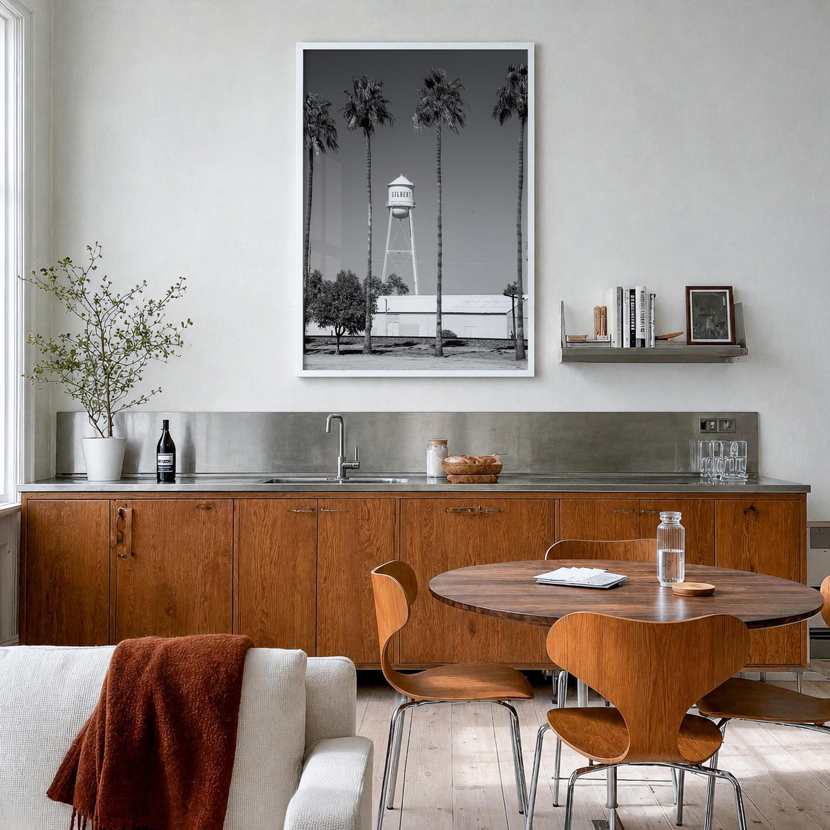 Water Tower no. 2 black & white photo poster – vertical wall art in white wood frame, hanging on wall